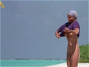 stellar Bo Derek demonstrating off her furry snatch at the beach