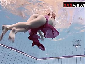 Smoking red-hot Russian redhead in the pool